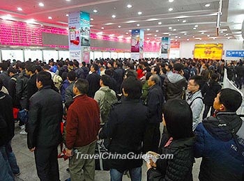 Long Queue for Buying Tickets at a Bus Station