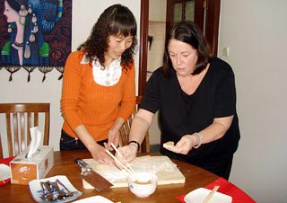 Ms. Dianne Learning to Make Dumplings