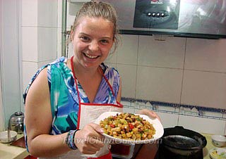 Ms. Skye Rachel Miller with the Kung Pao Chicken Cooked by Herself