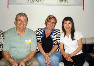 Mr. Robert Donovan Orchard & Ms. Deardra Erin Orchard with the Chinese Hostess