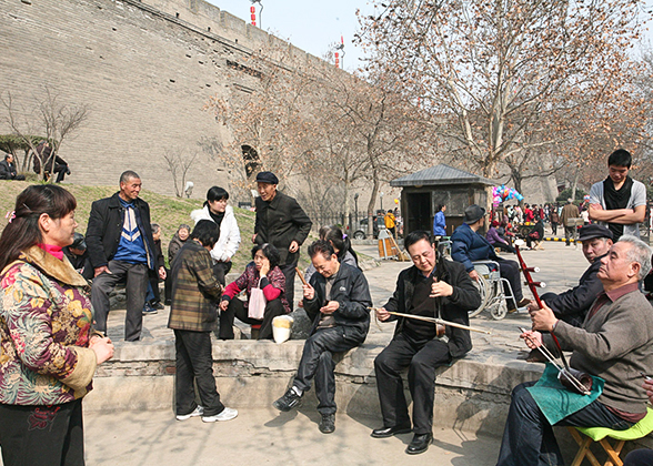 Playing the Erhu