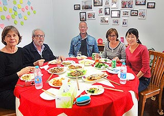 Our Guests Having Dinner in a Chinese Family