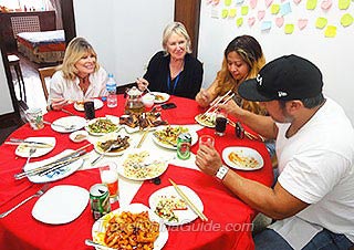 Our Guests Dining in a Local Family