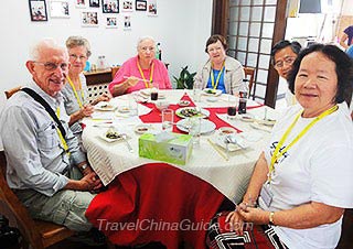 Our Guests Dining in a Local Family