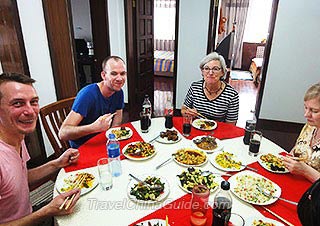 Our Guests Dining in a Local Family