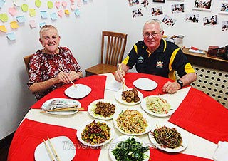 Our Guests Dining in a Local Family