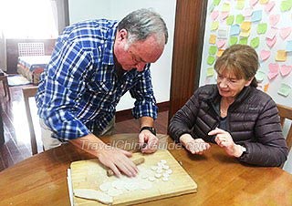 Thomas and Susan Making Dumplings