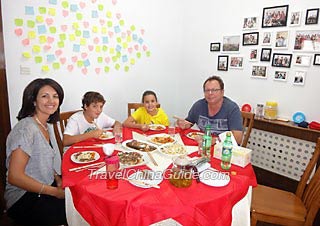 The Murie's Dining in a Local Family