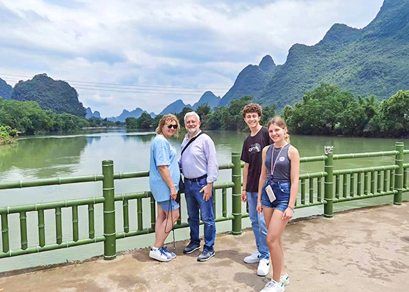 Guests on Li River Bridge