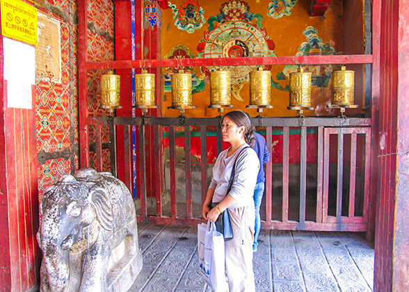 Visitor inside Tsubu Monastery