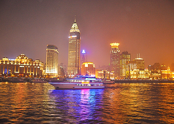 Huangpu Cruise Ship Passing by Buildings of Puxi